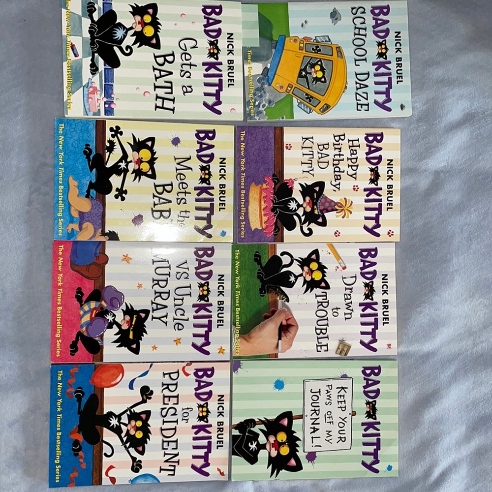 Bad kitty book lot-7 books and 1 journal. First page of journal has some writing